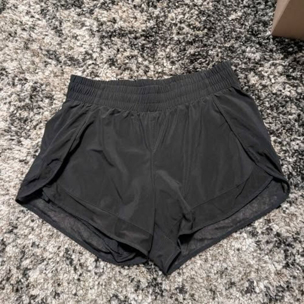 Athleta mesh racer run mid-rise 4" shorts XS